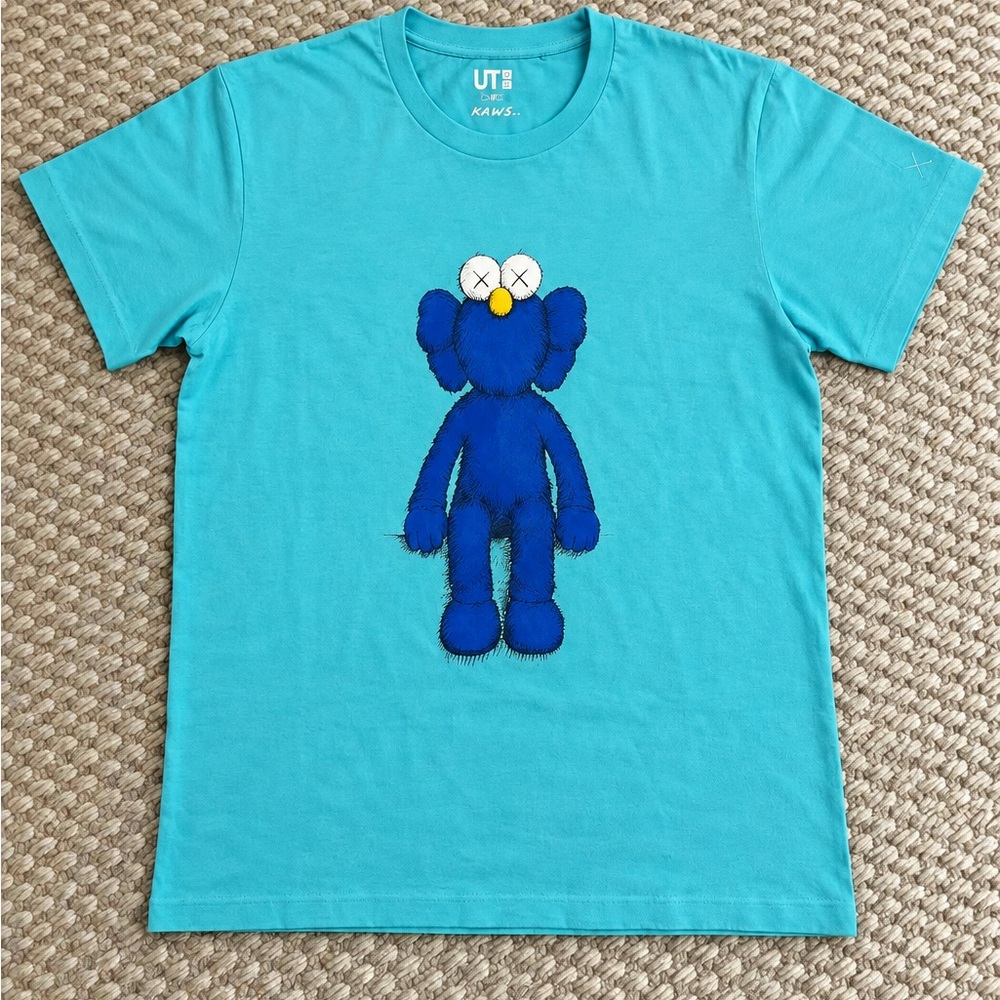 Uniqlo Kids Teal T-Shirt with Blue Character Graphic